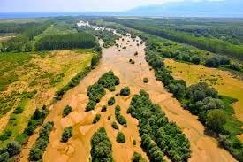 A river running out into floodplains in Southern Italy - the future of creating multiple habitats from a single water source. A river running out into floodplains in Southern Italy - the future of creating multiple habitats from a single water source.
