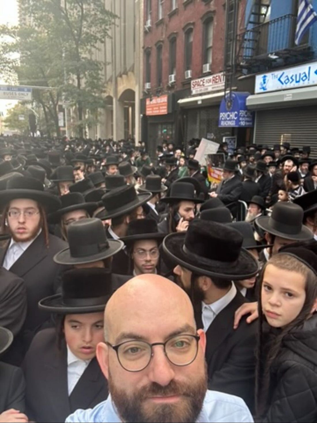 Mitchell Jackson selfie in a crowd