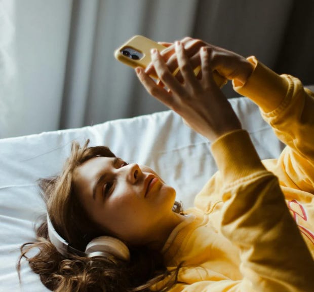 woman looking at phone