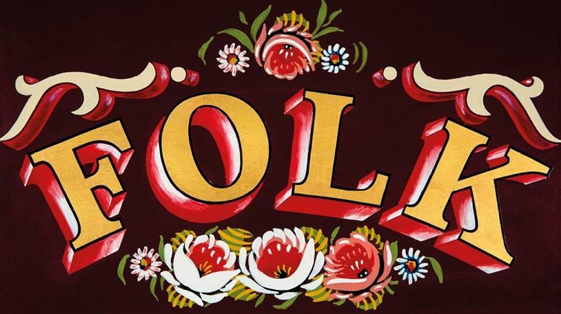 A sign with flowers and letters

AI-generated content may be incorrect.
