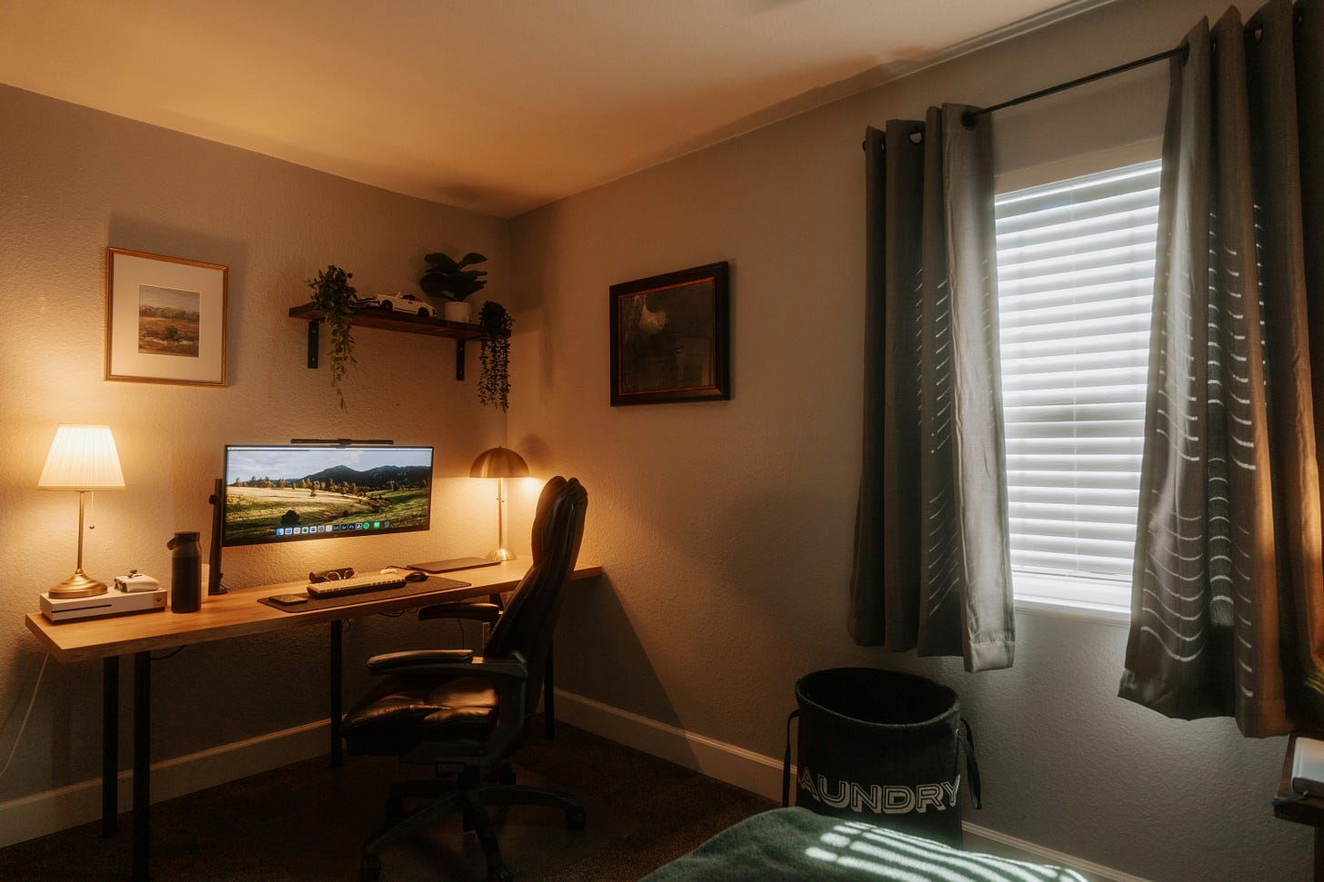 Image of a home office with desk and chair by Elijah Pilchard on Unsplash.