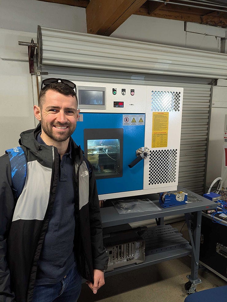 Stephen with a machine that simulates the extreme hot and cold of space image Stephen with a machine that simulates the extreme hot and cold of space image