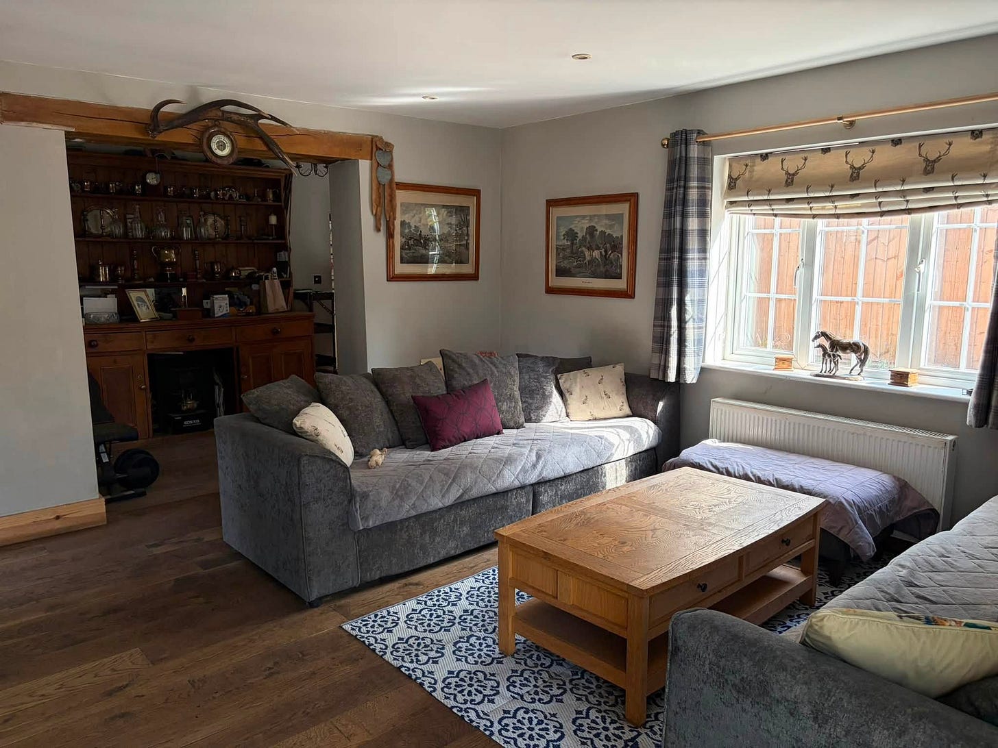 May be an image of indoors, bedroom, sliding door and living room