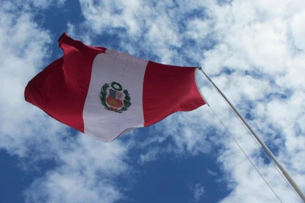 Peru flag waving in Cusco