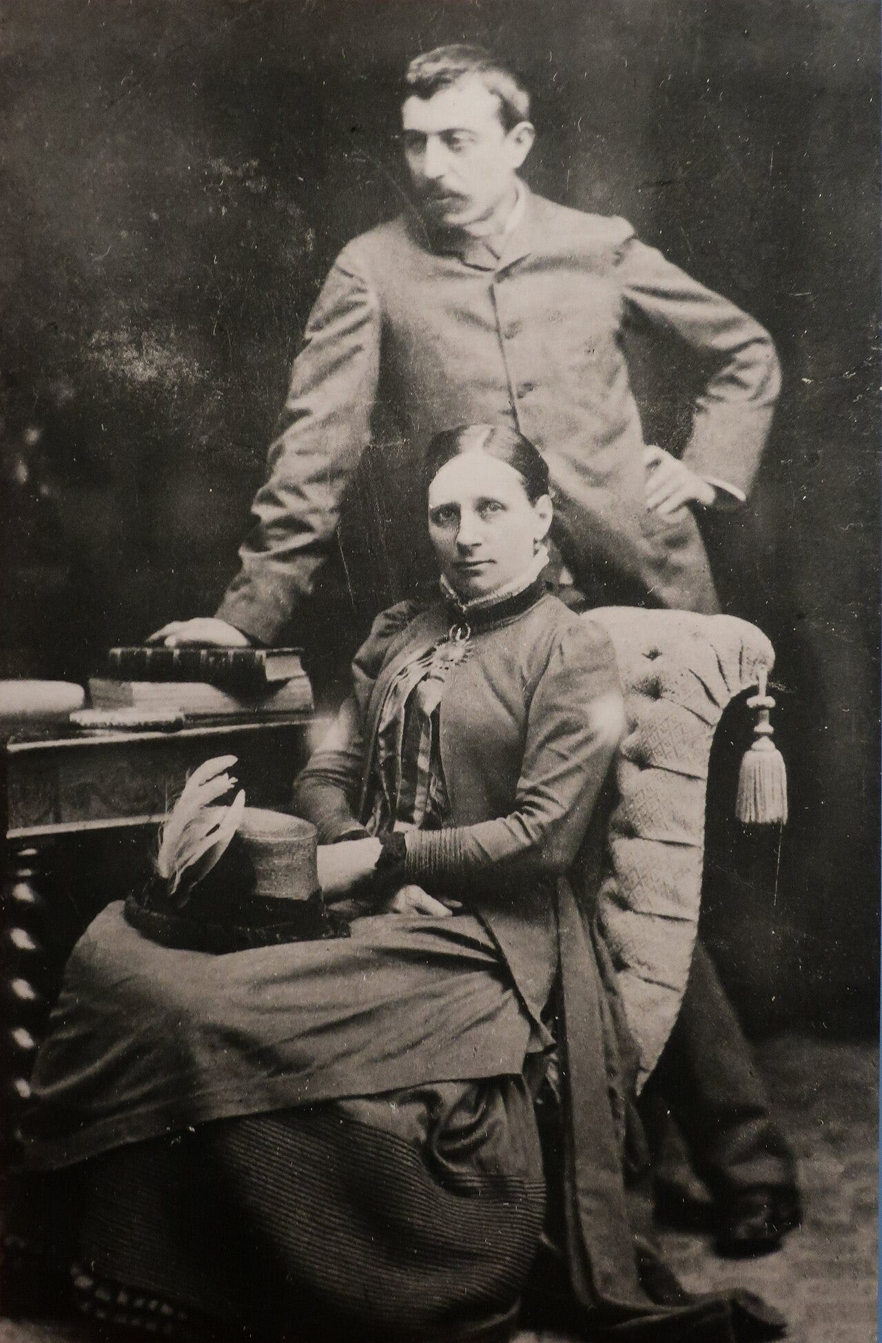 Period photograph of Paul Gauguin seated beside his wife Mette.
