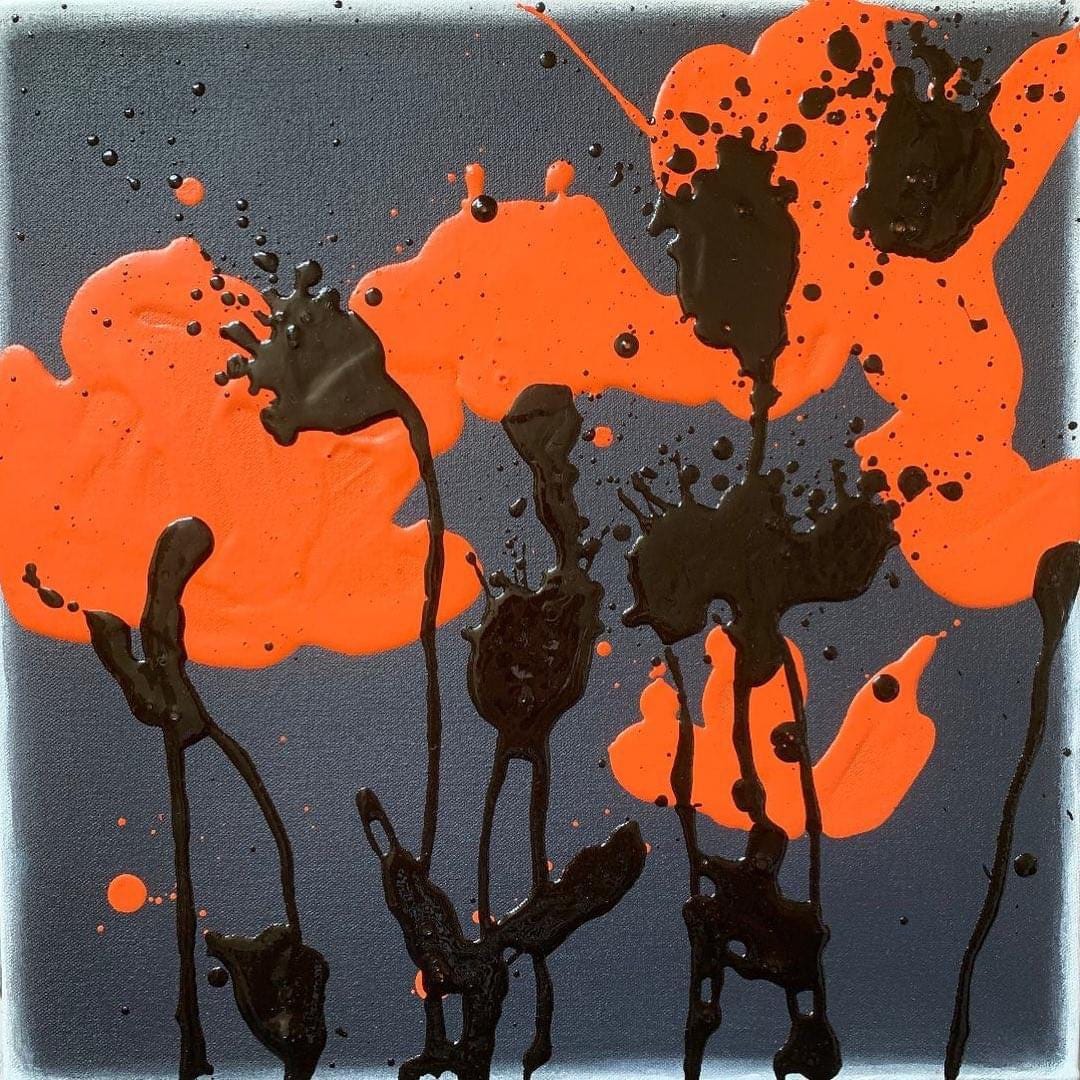 An abstract red/orange and black painting 