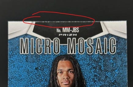 Example on edge chipping for PSA grading on 2024 Panini Micro Mosaic Jonathan Brooks rookie card. Example on edge chipping for PSA grading on 2024 Panini Micro Mosaic Jonathan Brooks rookie card.