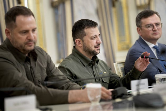 Andriy Yermak (left), and Dmytro Kuleba (right) listen as Ukraine's President Volodymyr Zelenskyy meets with Antony Blinken.