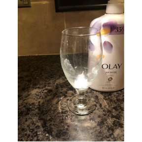 A glass on a counter

Description automatically generated