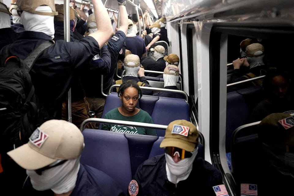 Photographer Cheney Orr captured an image of a Black woman sitting on a Metro train surrounded by members of the white nationalist group Patriot Front. Now, that photo is going viral (Reuters)