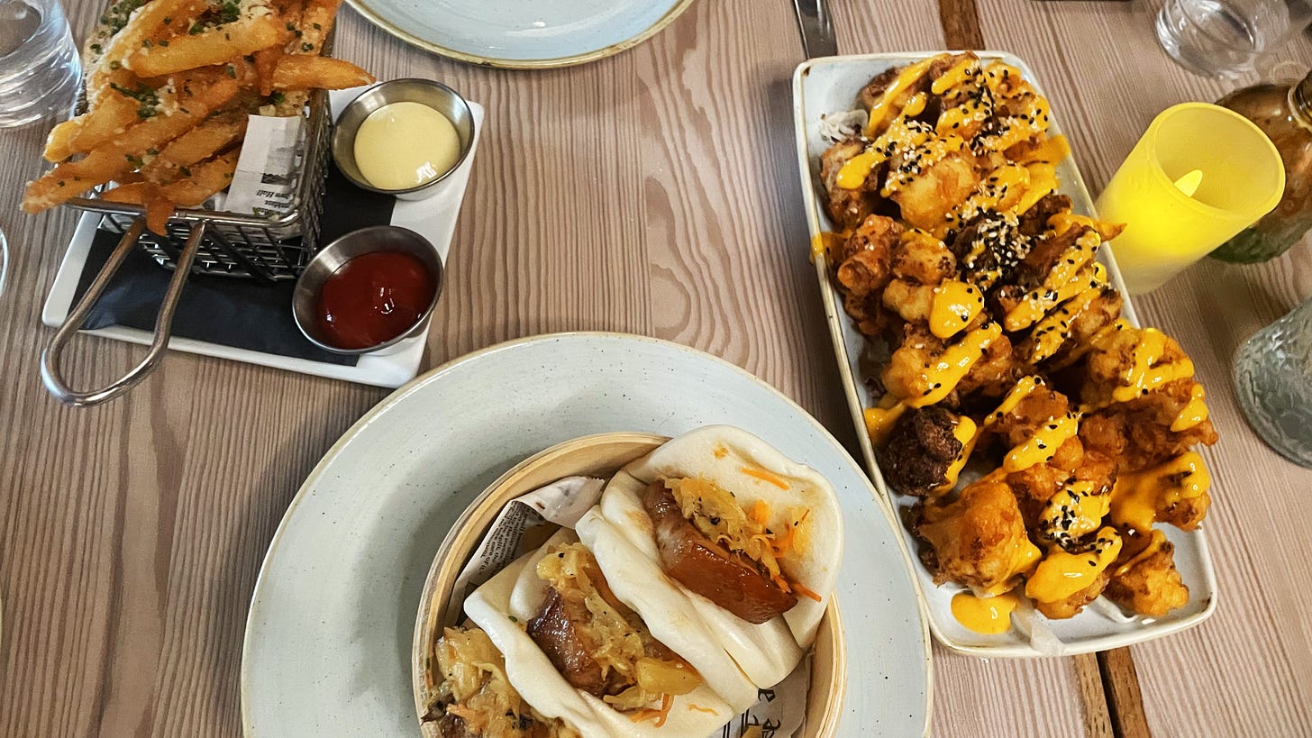 Truffle Fries, Pork Belly Baos, and Crispy Cauliflower at Dolly Varden in New York City