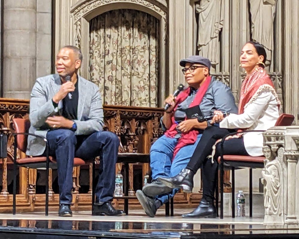 Photo showing a panel of speakers sitting in a church. From left to right, Ta-Nehisi Coates, Keeanga-Yamahtta Taylor, and Noura Erakat Photo showing a panel of speakers sitting in a church. From left to right, Ta-Nehisi Coates, Keeanga-Yamahtta Taylor, and Noura Erakat