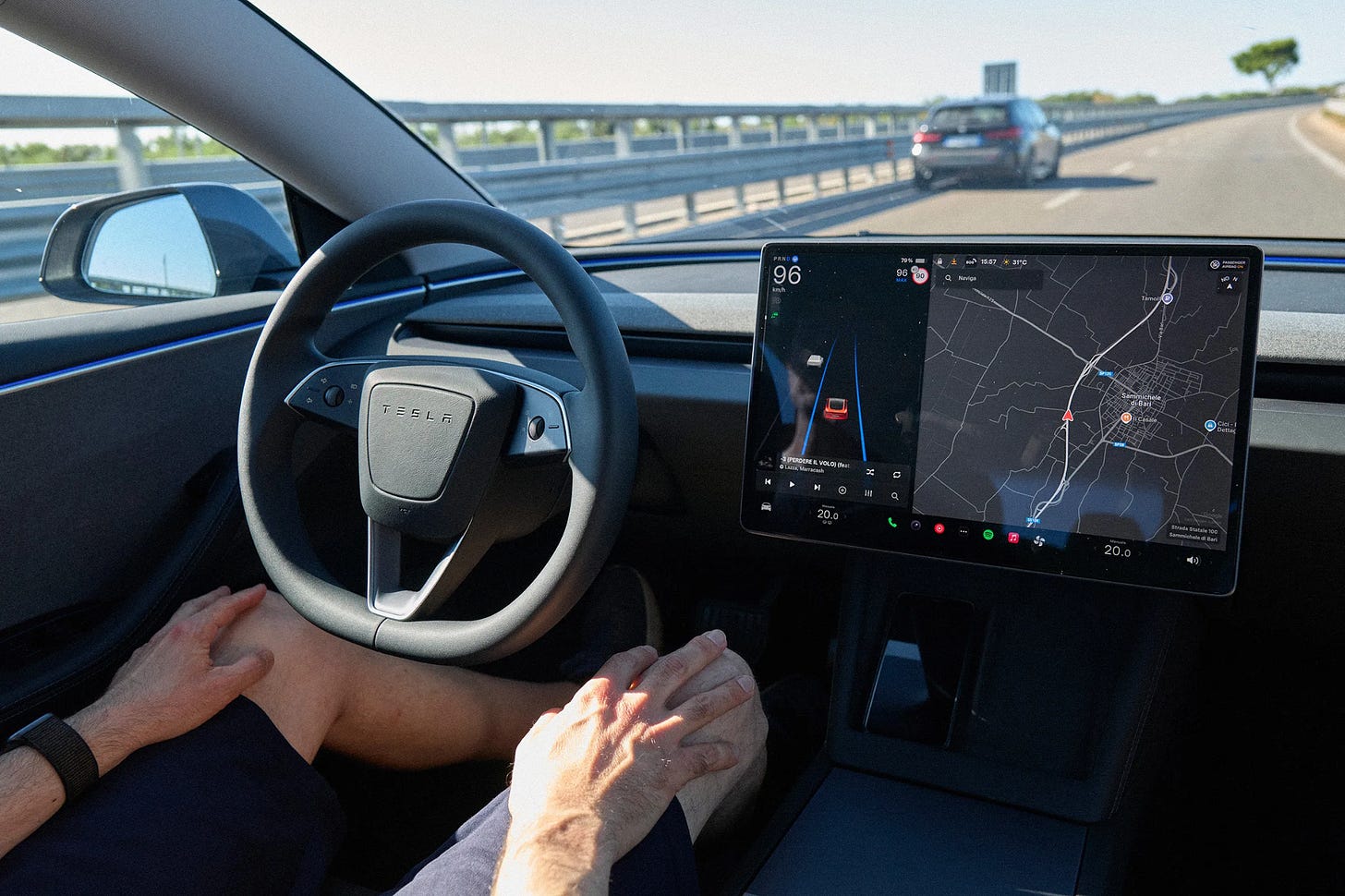 Tesla Full Self-Driving interior view on highway Tesla Full Self-Driving interior view on highway
