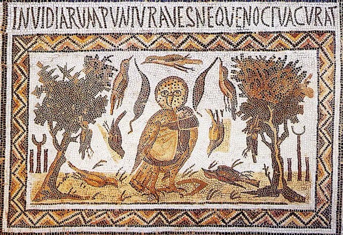 Mosaic artwork in earth tones shows central owl figure with wide eyes and wings partially spread standing on ground amid trees with branches and leaves birds flying and perched around it Latin text borders top and bottom including words like INVIDIA RUMPUNTUR AVES NEQUE NOCTUA CURAT geometric patterns frame edges