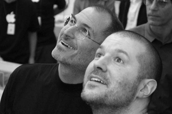 A close-up of a couple of men

Description automatically generated
