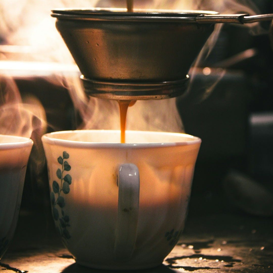white ceramic cup with coffee
