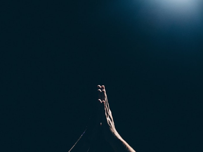 person raising arms
