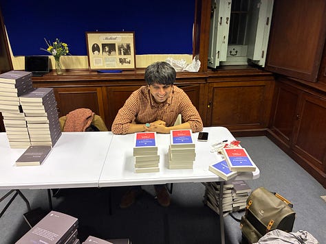 Gonzalo signing books