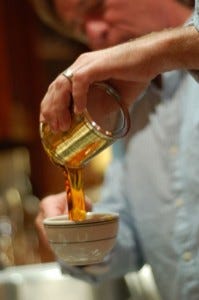 C pours the liquid love