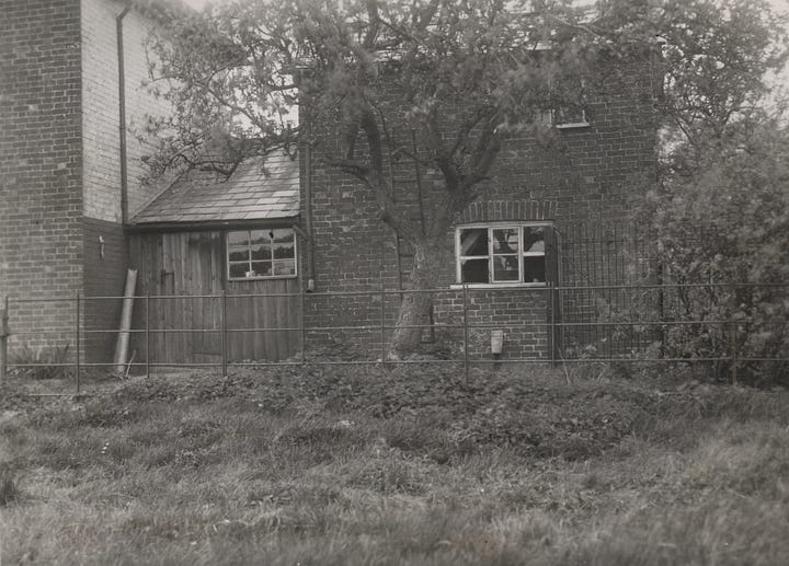 A series of photos showing bomb damage from an accidental detonation. A car is smashed up, there are craters in the ground and the windows of nearby buildings are completely destroyed.