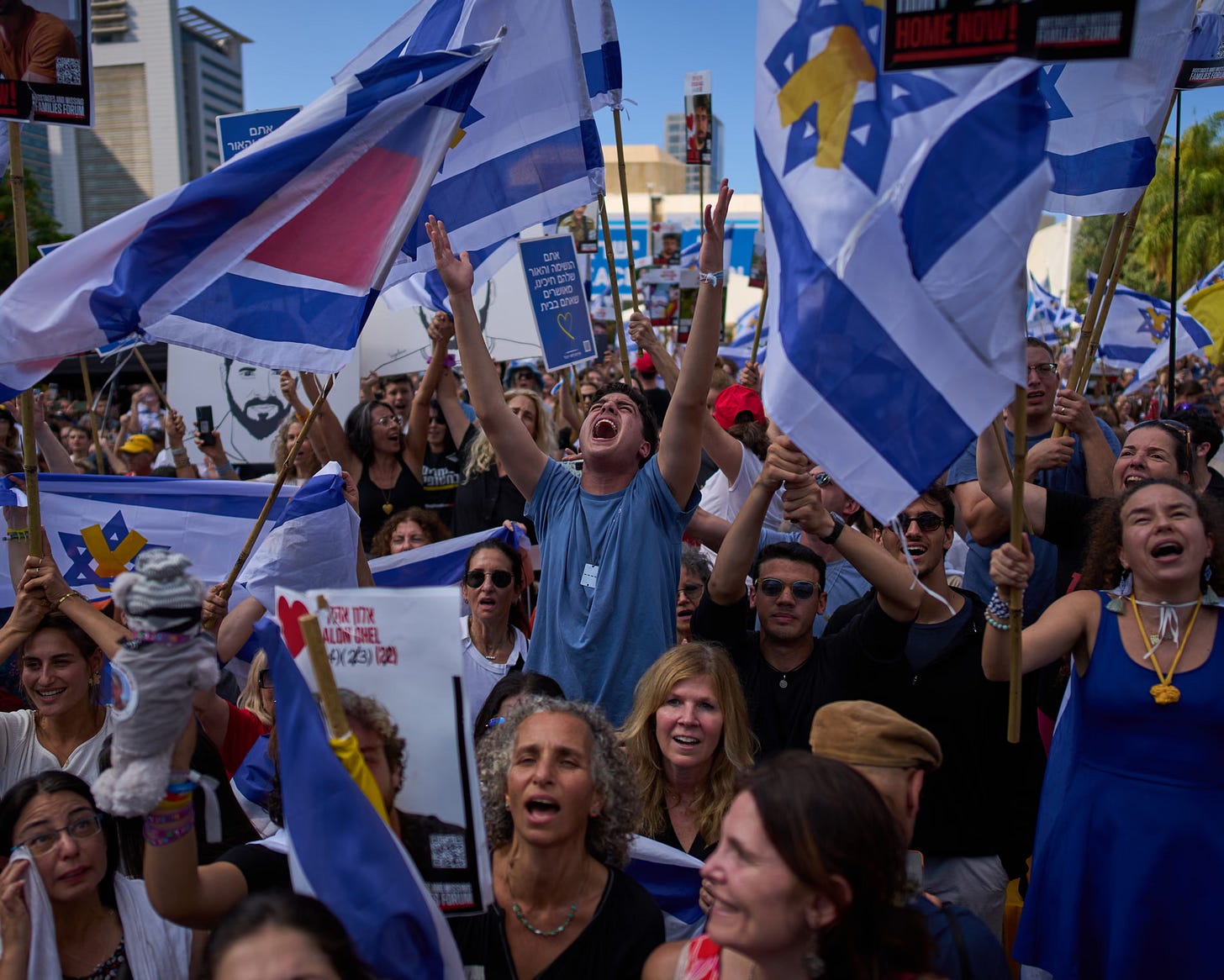 Israelis gathered in ‘hostages square’ in Tel Aviv watched a live broadcast of hostages being released by Hamas on Monday. Israelis gathered in ‘hostages square’ in Tel Aviv watched a live broadcast of hostages being released by Hamas on Monday.