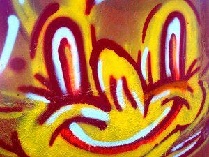 A cheery graffiti face on a bridge pillar seen on a run in Oakland. A cheery graffiti face on a bridge pillar seen on a run in Oakland.