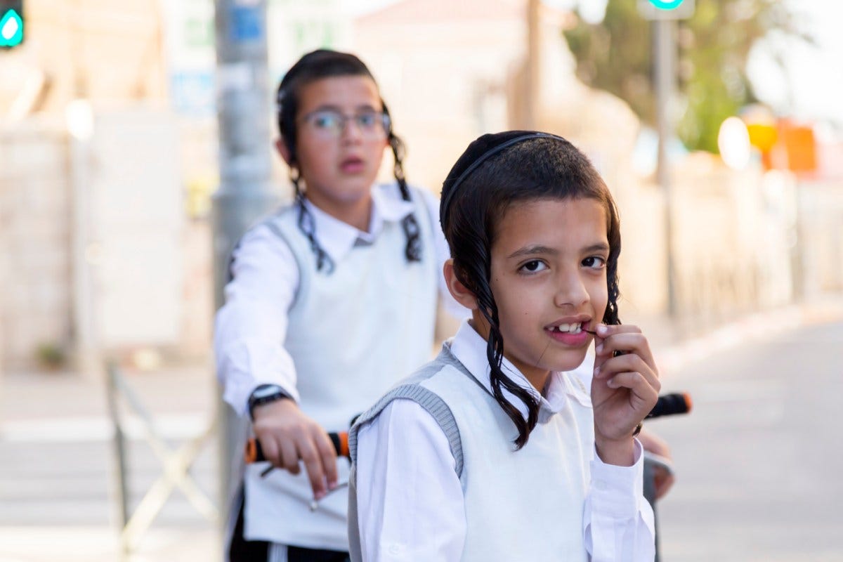 New York’s Hasidic Jewish schools take public funds but fail to educate kids | Hasidic Jewish kids riding bikes