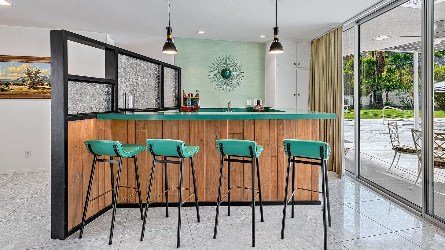 Howard Hawkes and Kevin Kemper of H3K HomeDesign refreshed the original wet bar in this Palm Springs home with new...