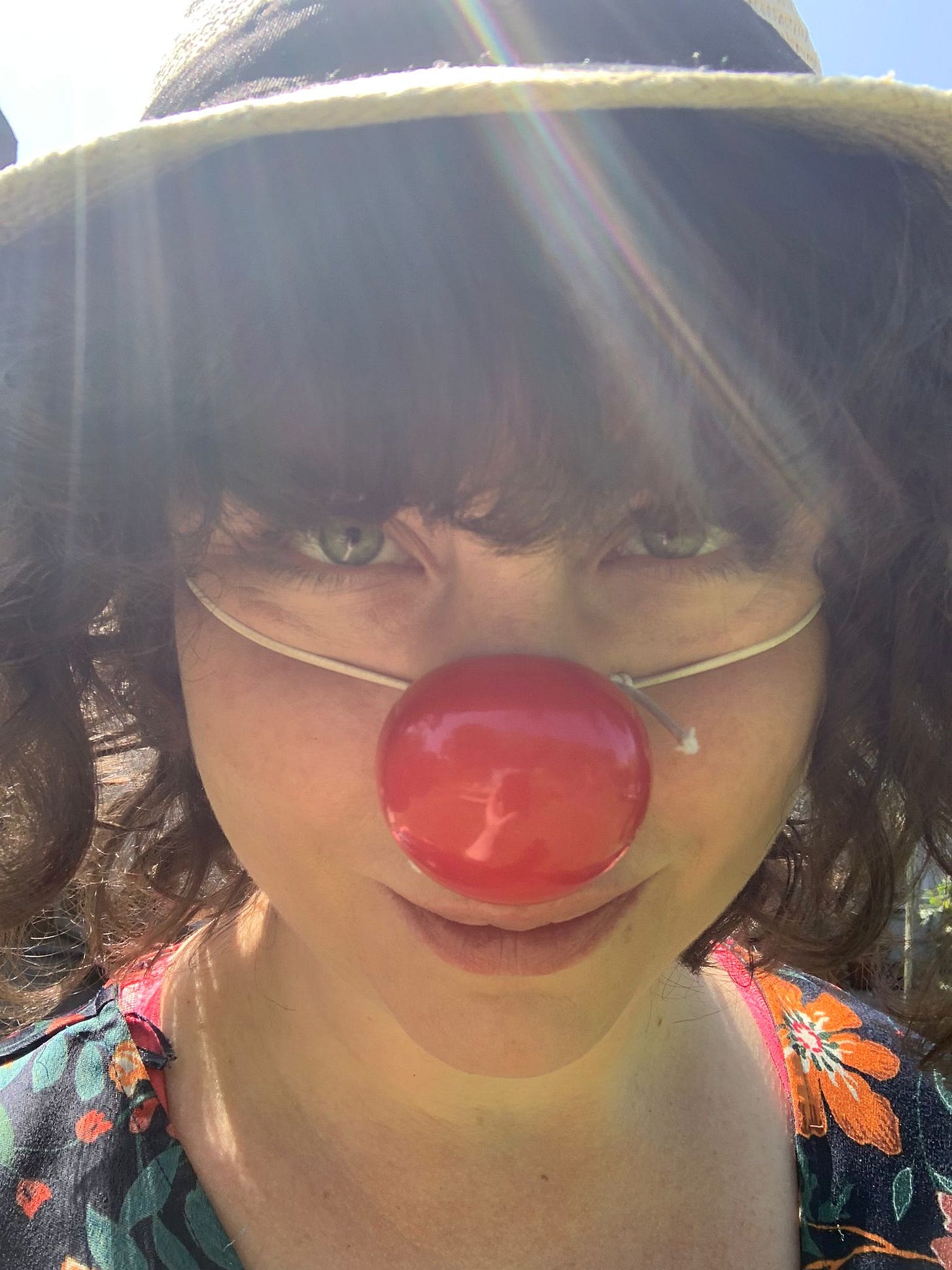 a clown with a clown nose on