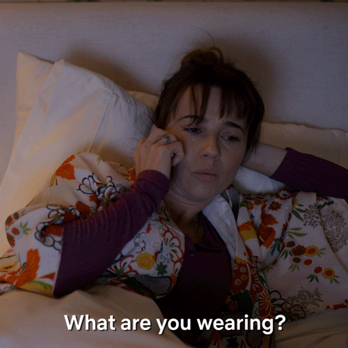 Judy: "What are you wearing?" Jen: "A pair of sweatpants." Judy: "Mm, slower" Jen: "What?" Judy: "What are you wearing?" Jen: "A pair of sweatpants." Judy: "Mm, slower" Jen: "What?"