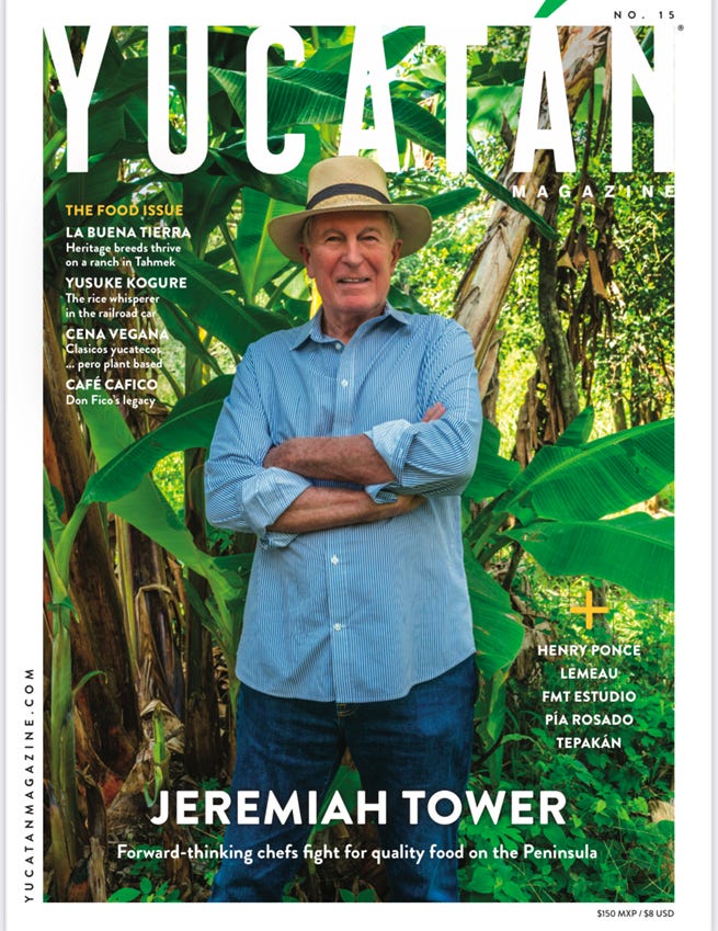 A person standing in front of a magazine cover

Description automatically generated