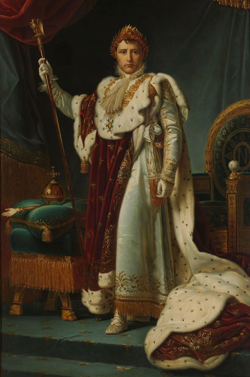 A white cis man, Napoléon Bonaparte, with a golden crown on his head, dressed in a king-link long white, red and gold robe, holding a scepter.