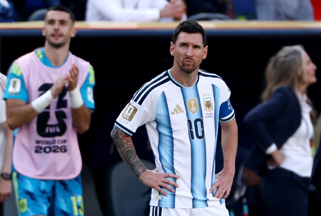 Lionel Messi looking dejected after Spain's Ferran Torres scores. Lionel Messi looking dejected after Spain's Ferran Torres scores.