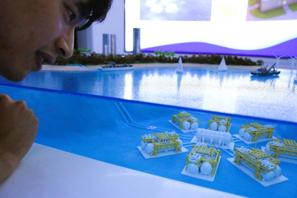 A visitor observes a miniature model of undersea data cabins for the undersea data centre in Lingshui, south China’s Hainan province, on September 25. Photo: Xinhua