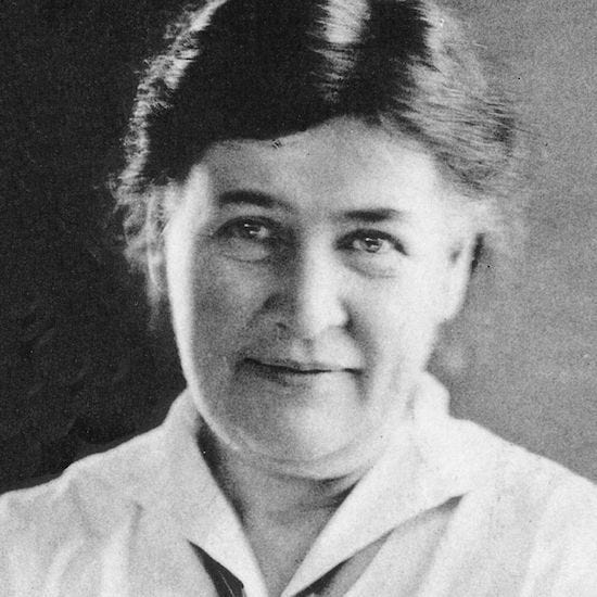 A black-and-white photograph of American author Willa Cather, who wrote the mystery story "Paul's Case."