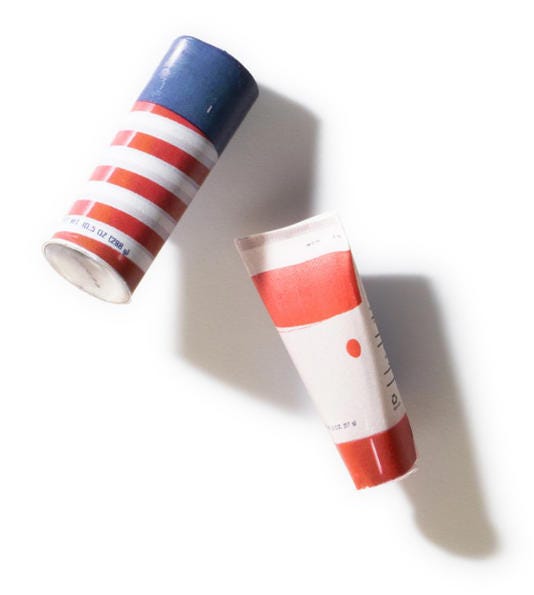Miniature shaving cream and lotion bottles made of paper Miniature shaving cream and lotion bottles made of paper