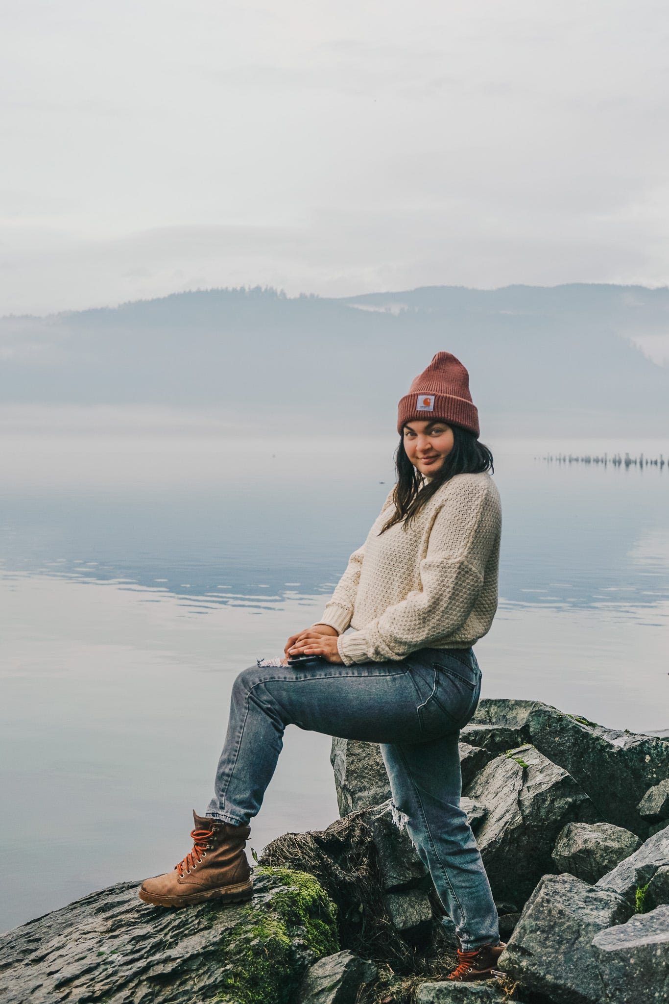 The author, Caitie, posing on a rocky shore with a slight smirk on her face that she has a secret she wants to share The author, Caitie, posing on a rocky shore with a slight smirk on her face that she has a secret she wants to share