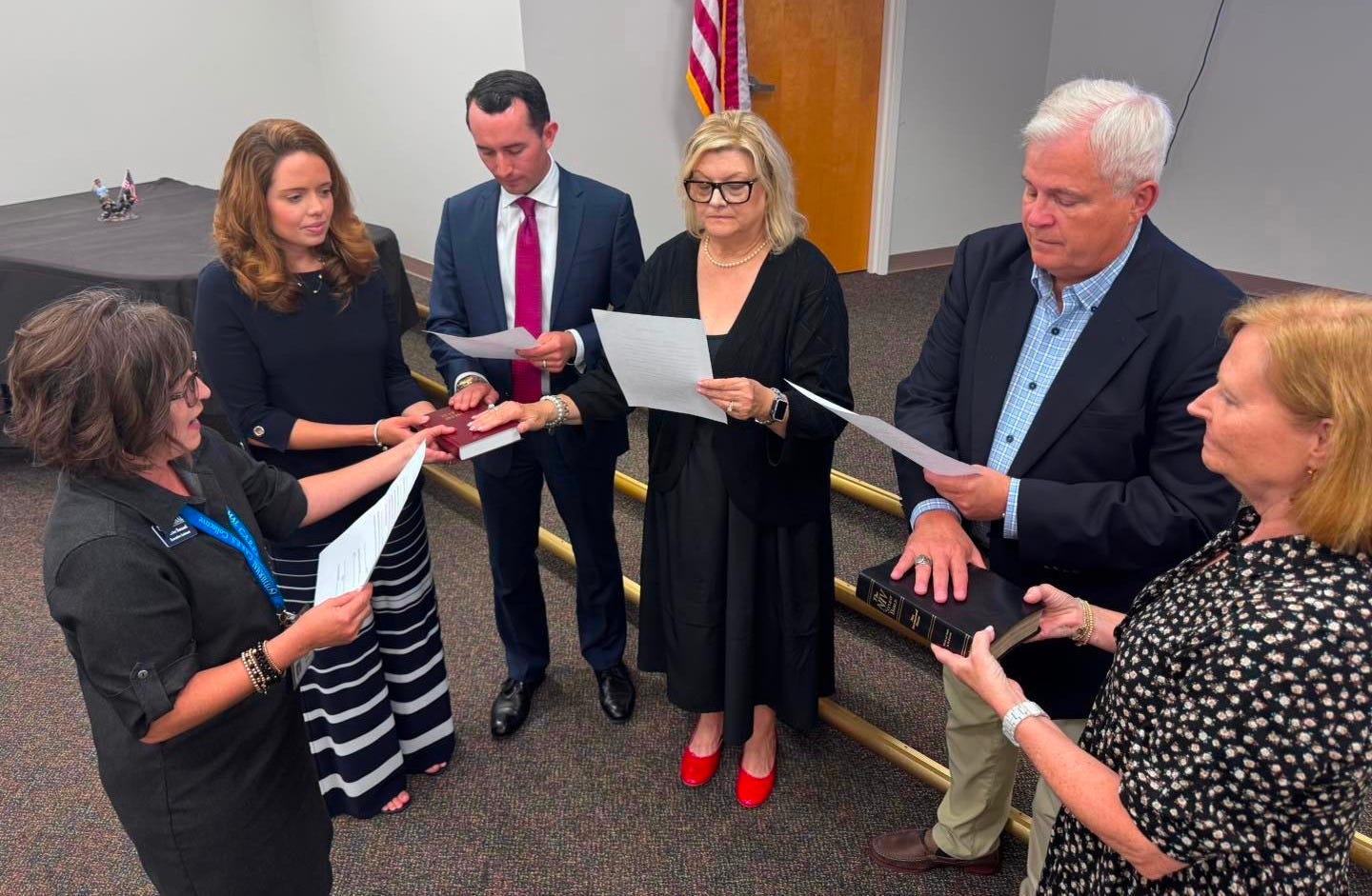 May be an image of 6 people and text