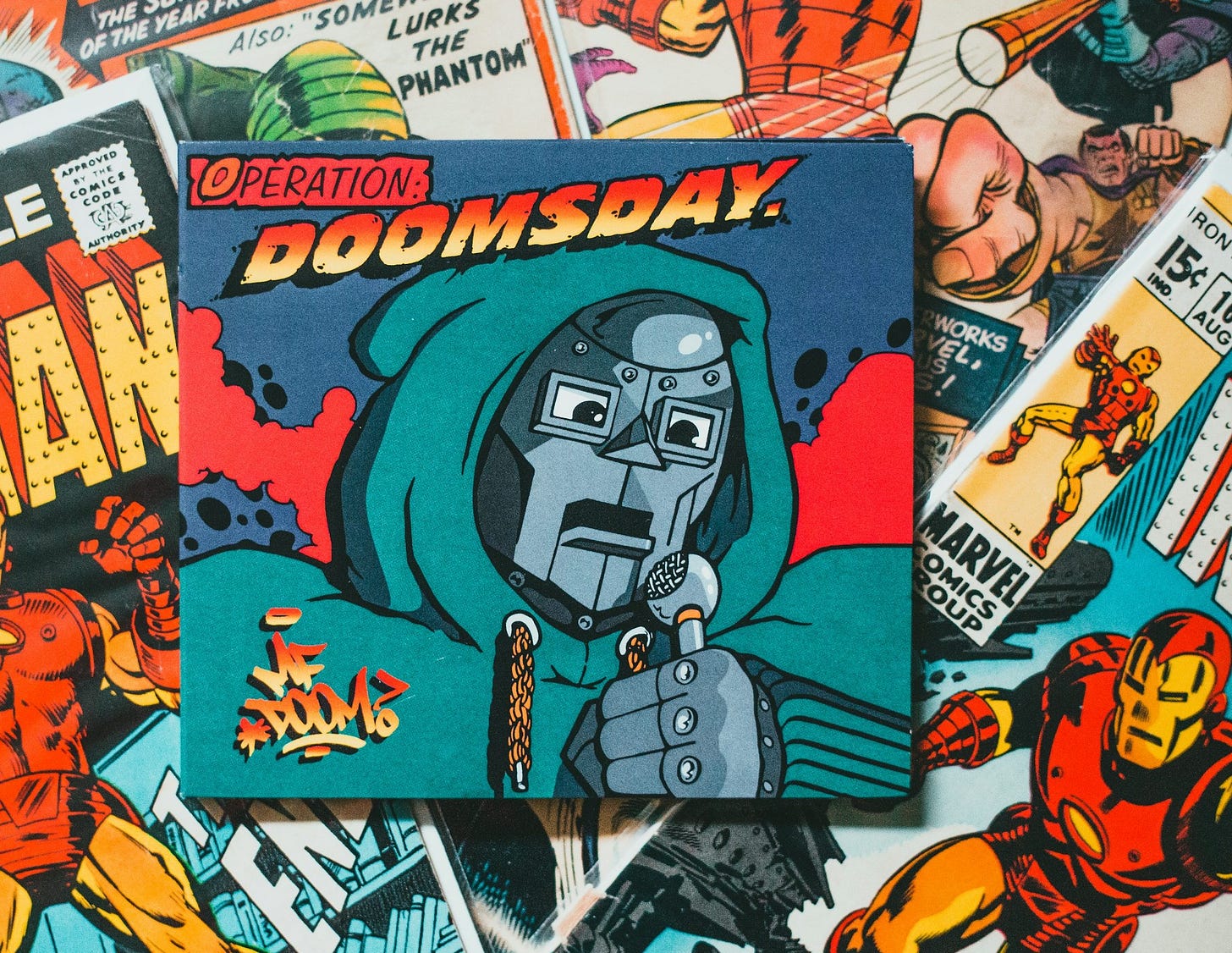 a bunch of comic books laying on top of each other a bunch of comic books laying on top of each other