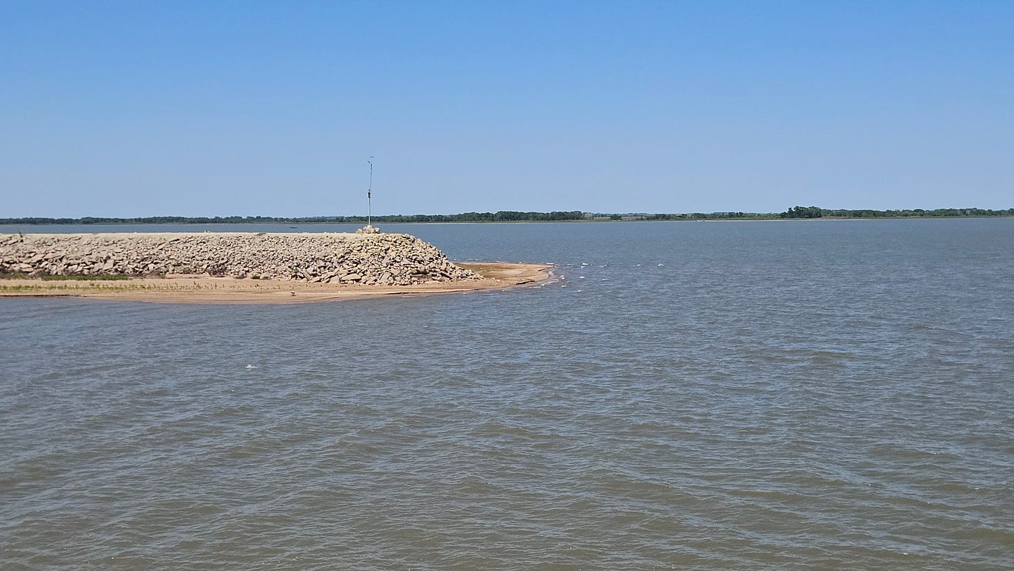 Exposed lakebed around Sailboat Cove jetty