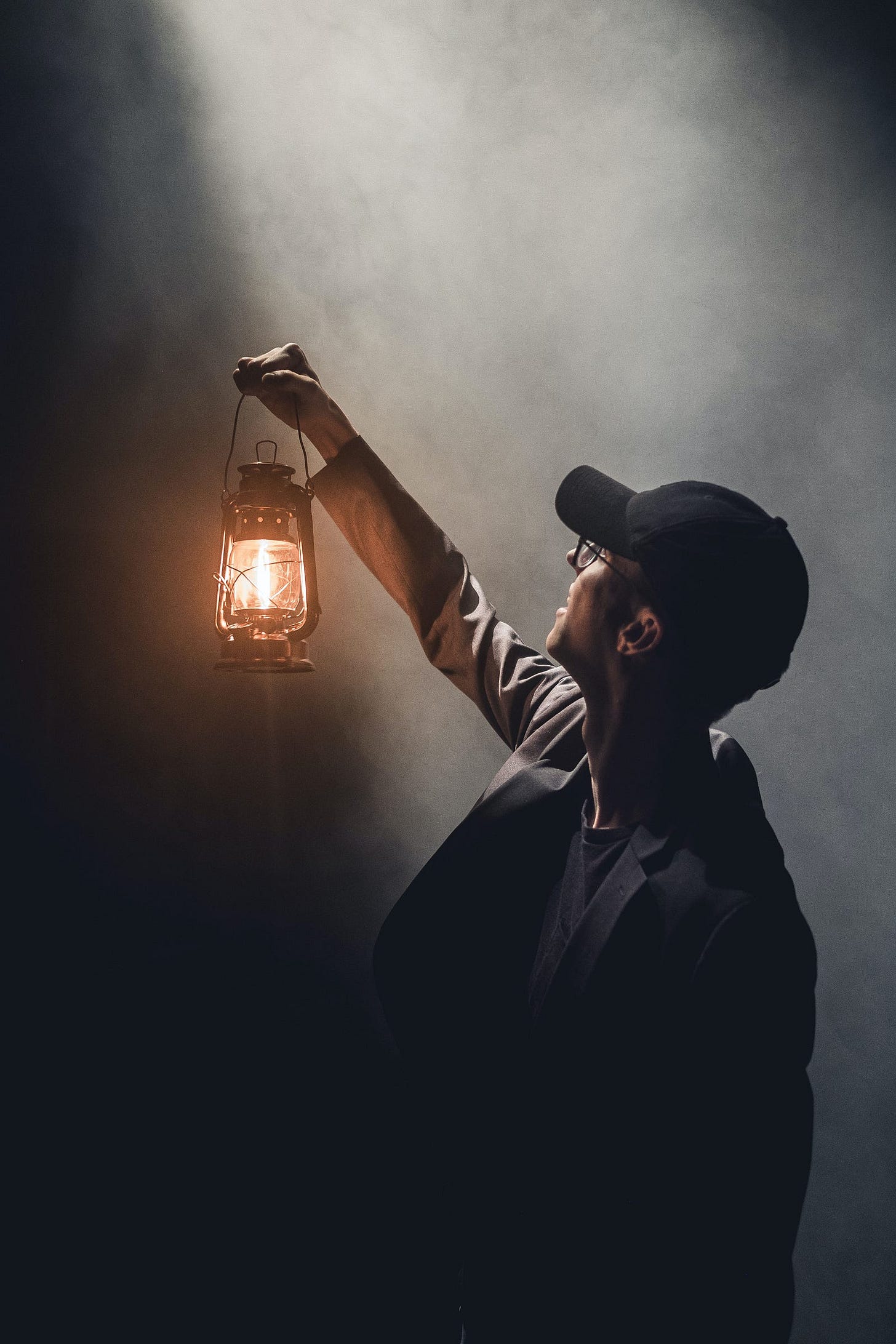The job market has become a dark and depressed space where employers decide what they want from applicants — who then try their best to look like the right candidate; disregarding their own needs that are left in the darkness. But could we switch on the light and focus on those needs? Image shows a man holding a lit lantern up in a dark room, trying to bring light to it. The job market has become a dark and depressed space where employers decide what they want from applicants — who then try their best to look like the right candidate; disregarding their own needs that are left in the darkness. But could we switch on the light and focus on those needs? Image shows a man holding a lit lantern up in a dark room, trying to bring light to it.