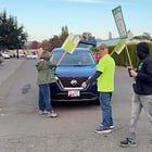 Vehicle Bumps Picketer at Public Works Entrance