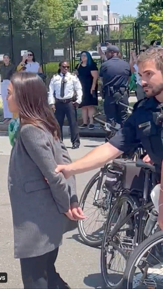 AOC mocked for 'pretending to be handcuffed' while being arrested by  Capitol Police during abortion rights protest