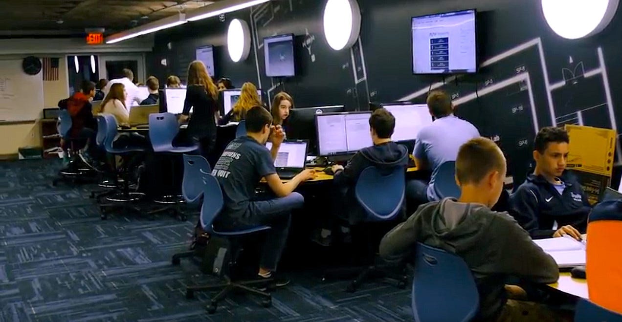Students in the Information Technology Lab at collaboration stations Students in the Information Technology Lab at collaboration stations