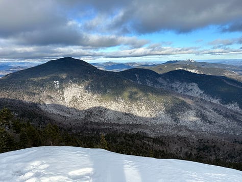 Pictures of Liz, Seth, and the dogs hiking snow-covered mountains