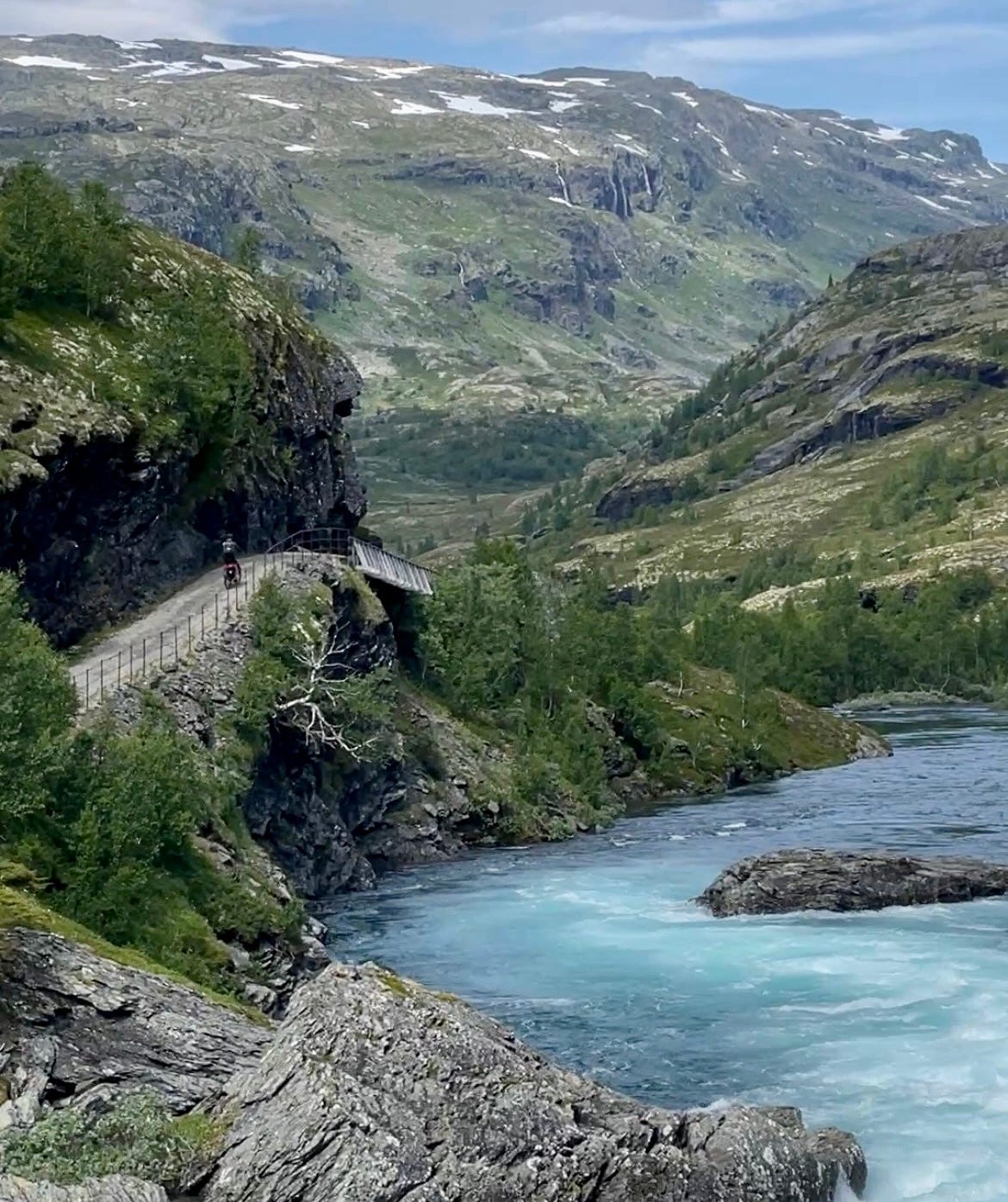 Cycling Norway’s Rallarvegen near alpine lakes and waterfalls