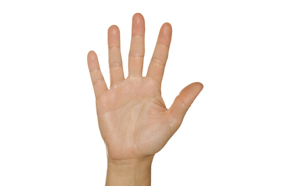 A hand with five fingers stretched