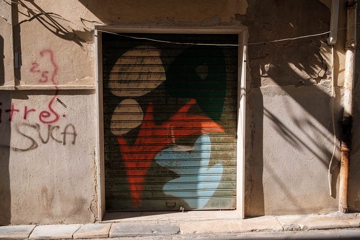Graffiti and signs on garage doors
