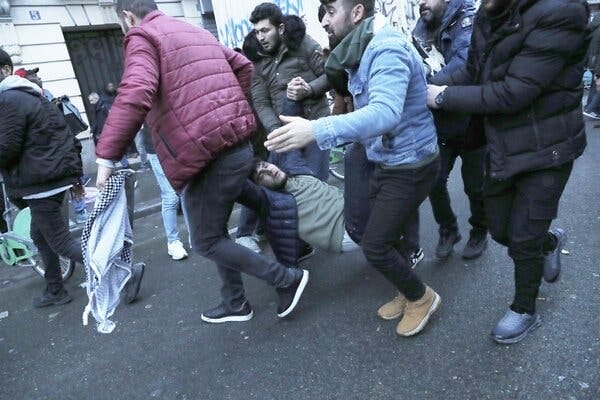 Protesters and French police officers clashed after the shooting in Paris. Protesters and French police officers clashed after the shooting in Paris.