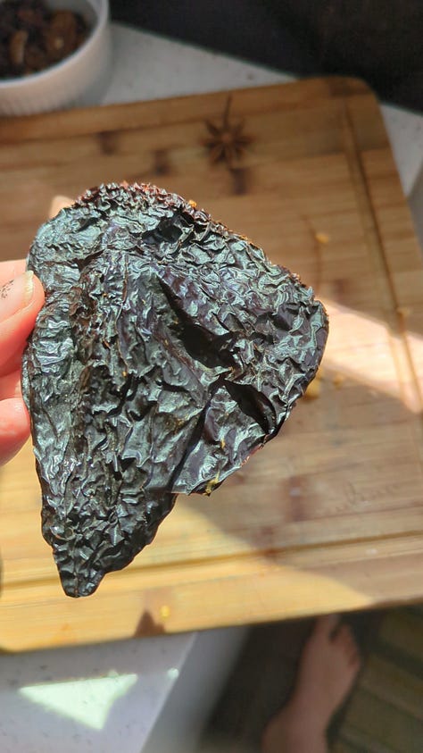 Piloncillo (traditional mexican raw sugar), tomatoes and ancho chile I used in a batch of mole.